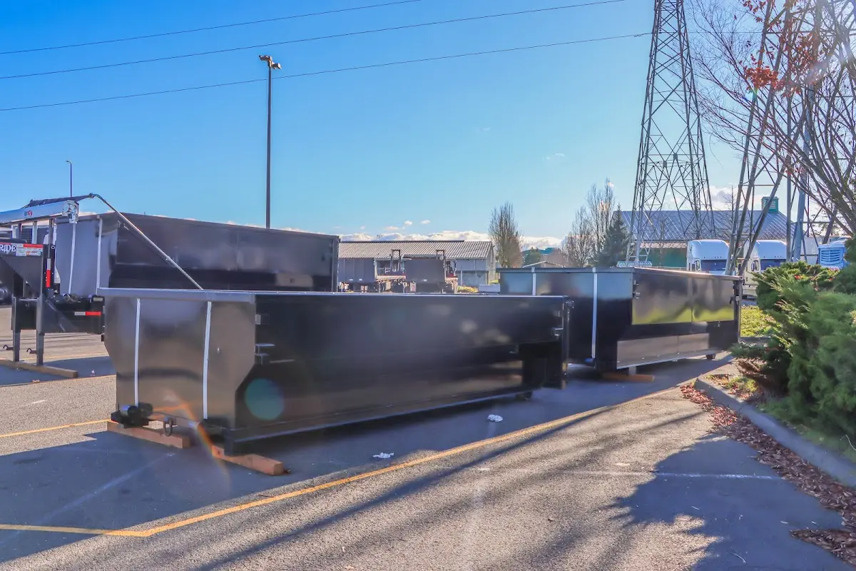 Roll-off dumpster ready for waste disposal at job site for Construction Dumpster Rental in Whispering Pines
